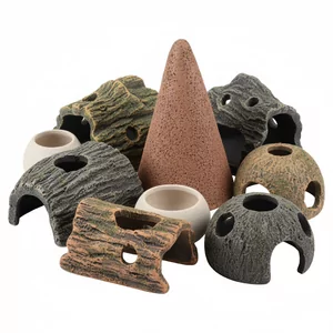 Ceramiczne groty i tarliska - Ceramiczne groty i tarliska to specjalistyczne dekoracje akwariowe, kt�re ��cz� funkcj� estetyczn� z praktyczn�. Wykonane z bezpiecznej ceramiki lub wysokiej jako�ci tworzywa, stanowi� niezb�dny element wyposa�enia ka�dego akwarium, zapewniaj�c rybom naturalne warunki do ukryw...